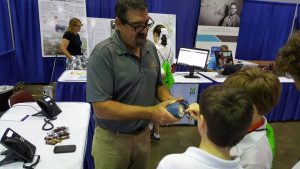 wavefly employee demoing products to kids